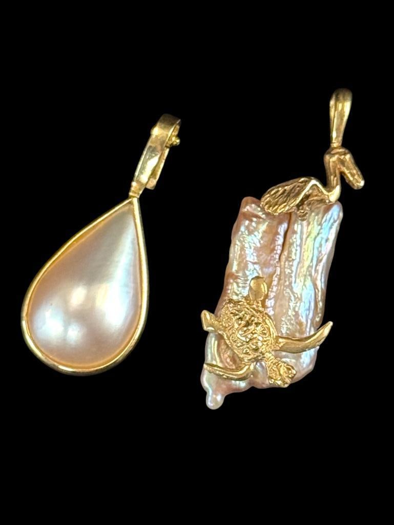 14k Gold and Mother of Pearl Pendants: 14k Gold and Mother of Pearl Pendants. 2 pieces One has a lovely Pelican and Turtle.