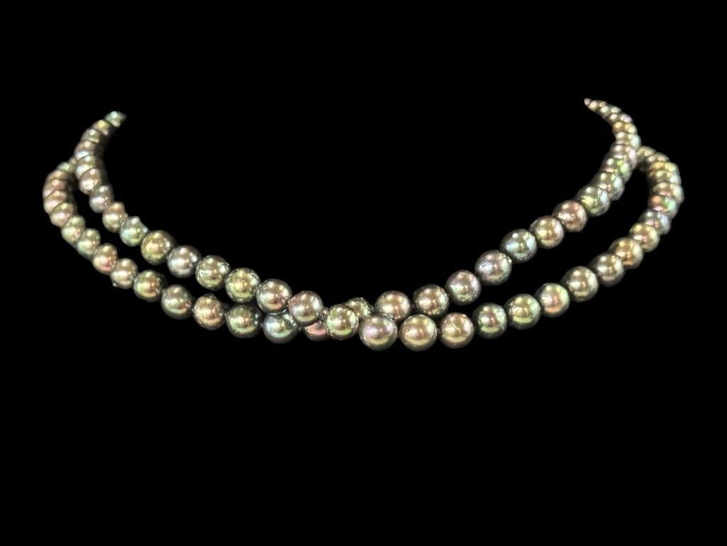 14k Gold and Tahitian Pearl Necklace: 14k Gold and Tahitian Pearl Necklace. Approx. 30 inch length.