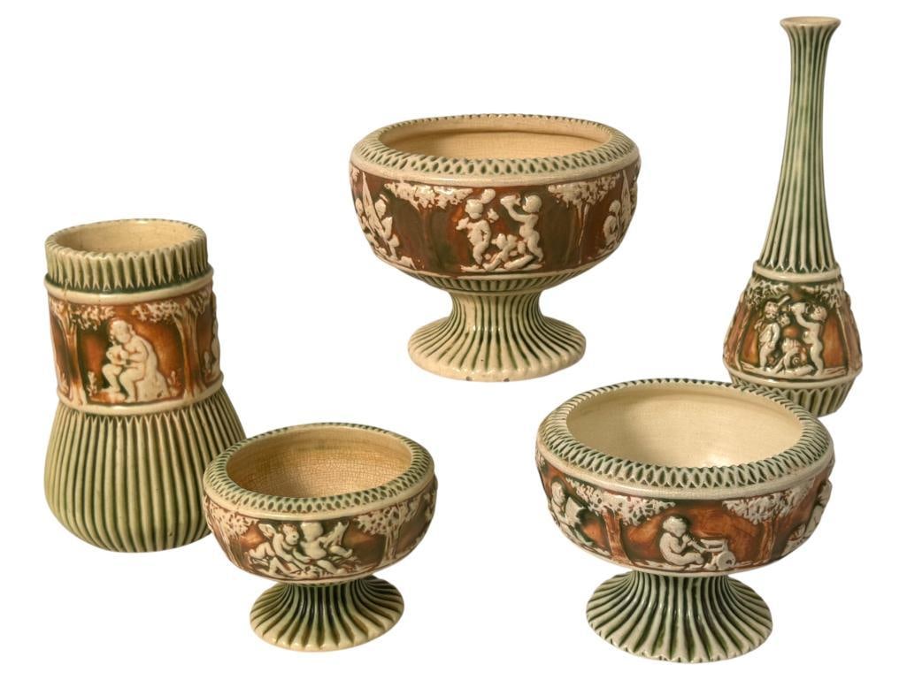 Roseville Pottery Donatello Vases: Roseville Pottery Donatello Vases and planters. 5 pieces. Tallest approx. 10 inches..