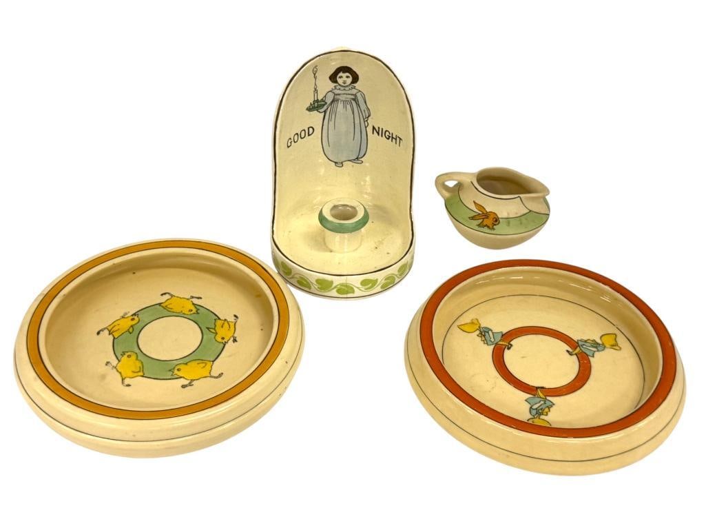 Roseville Pottery Plates and Candlestick: Roseville Pottery Juvenile Plates, creamer and Good Night Candlestick. 4 pieces. Candlestick approx. 6.5 inches tall.