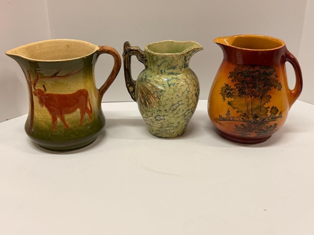 Roseville Pottery Cow Pitcher and more: Roseville Pottery Cow Pitcher and more. 3 pieces.