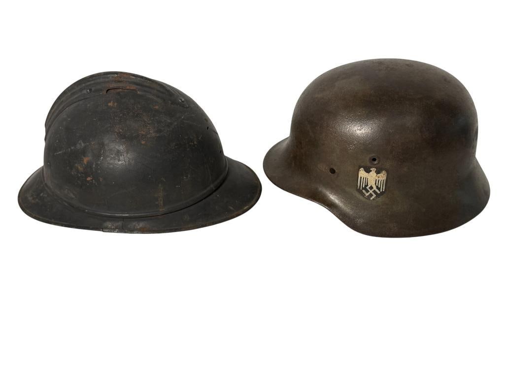 WW2 German and WW1 French Helmets: WW1 French Adrian M1915 helmet and WW2 German Helmet. 2 pieces.