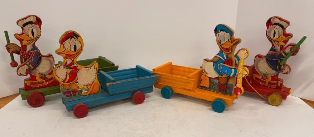 4 Fisher Price Donald Duck Pull Toys: 4 Vintage Fisher Price Donald Duck. #432-532 #550-463 # 500 #550-463.