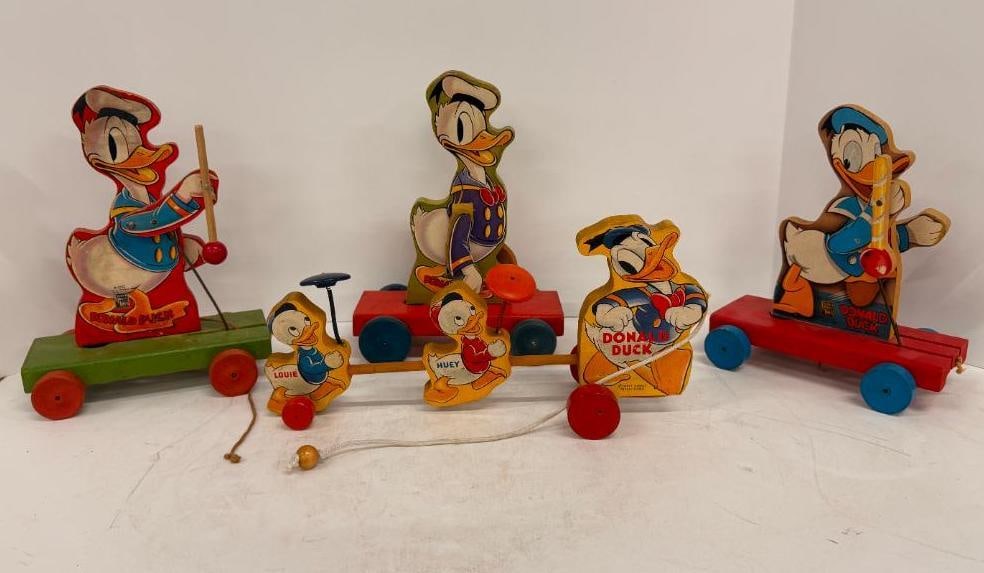 4 Fisher Price Donald Duck Pull Toys: 4 Vintage Fisher Price Donald Duck, Huey Luey #479 #432-532 #460 and #400.