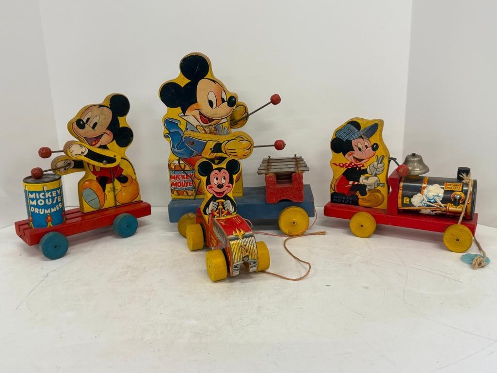 4 Fisher Price Mickey Mouse Pull Toys: 4 Vintage Fisher Price Mickey Mouse. Drummer WD Prod. Puddle Jumper #310. Choo Choo #485. Xylophone #798.