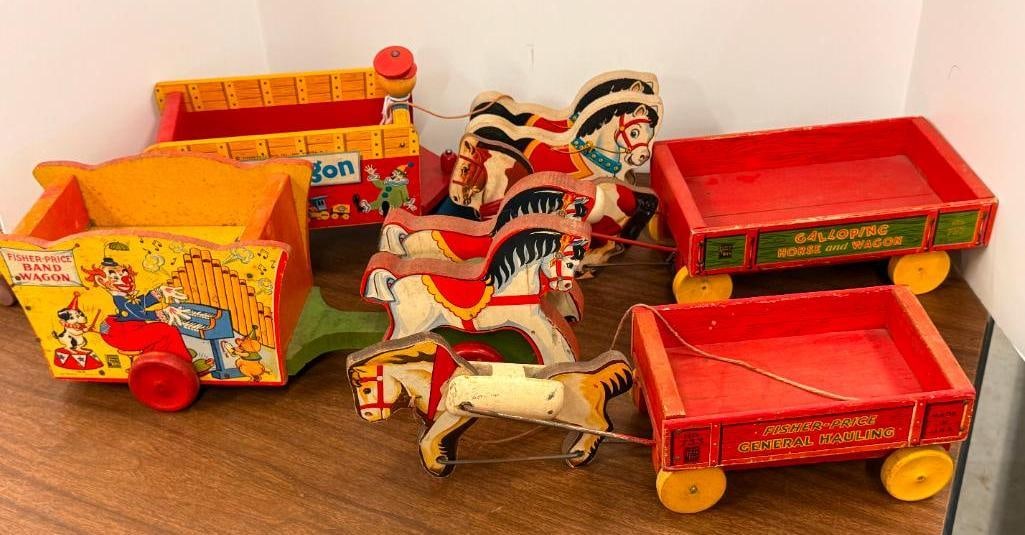4 Fisher Price Horses with Carts: 4 Vintage Fisher Price Horses with Carts. General Hauling #733. #737 Galloping Horse and Wagon. Bandwagon #198. Toy Wagon #131.