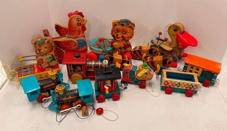 14 Fisher Price Pull Toys: 14 Fisher Price Pull Toys. Dinky, Huffy Puffy, Peter Pig, Tiny Teddy, Pelican #794, Chuggy Pop Up #616, Buzzy Bee #325, Bear #741, Katy Kackler #140.