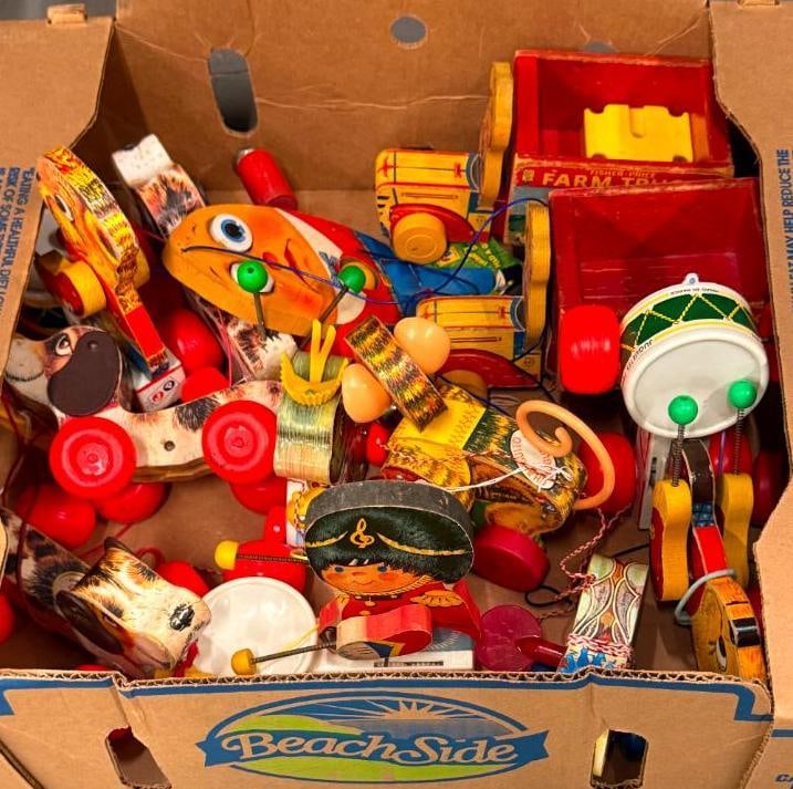 Fisher Price Pull Toys and more: Fisher Price Pull Toys and more. Little Snoopy, Humpty Dumpty, Drummer Boy 634, Farm Truck 845 and more. Approx. 13 pieces.