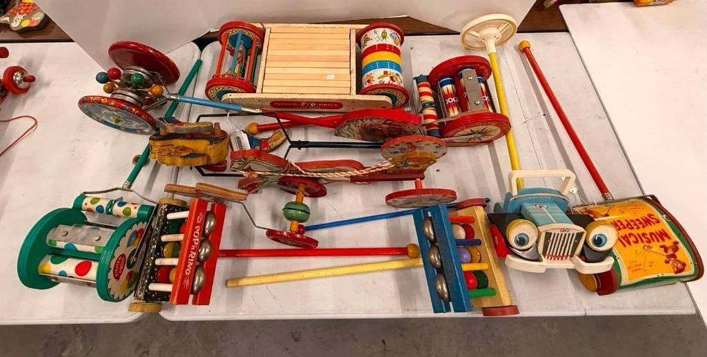 11 Fisher Price Push Toys and more: 11 Fisher Price Push Toys and more. Musical Sweeper, Roller Chimes, Pop N ring, Timber Toter etc.