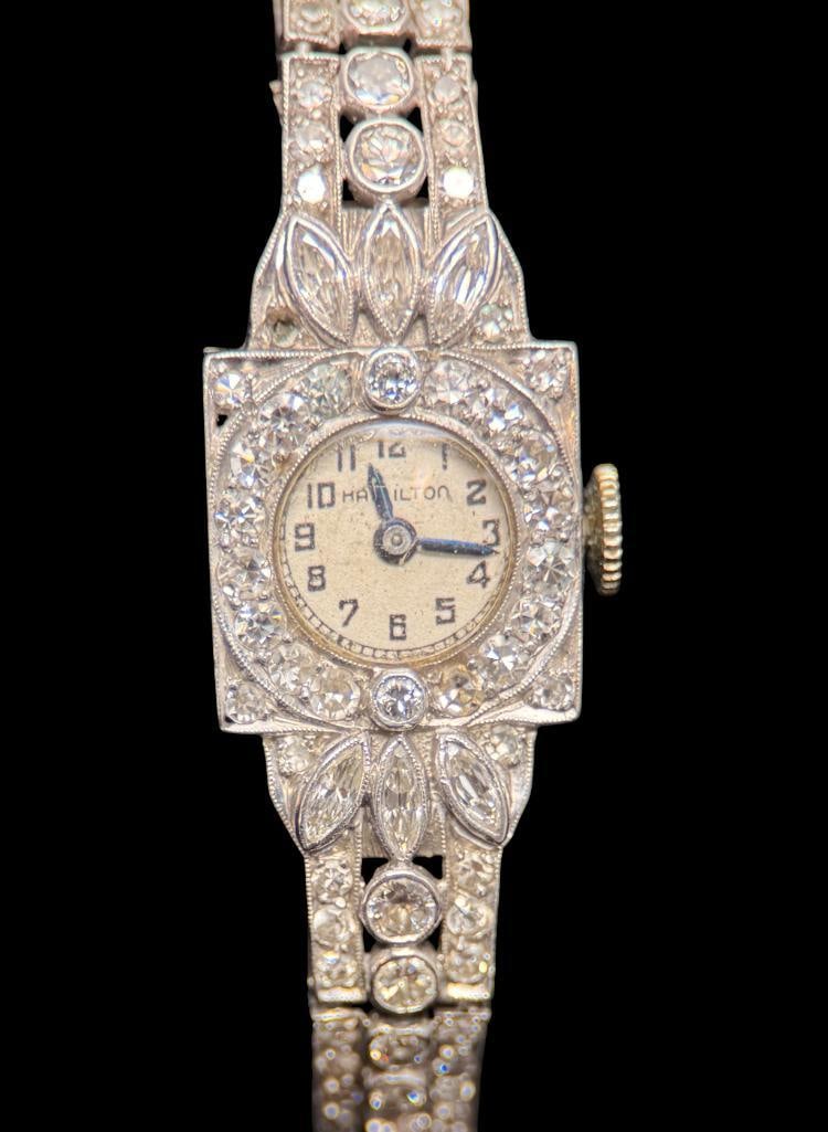 Ladies Hamilton Platinum and Diamonds watch: Ladies Hamilton Platinum and Diamonds watch. Approx. 21.2 grams with watch works.