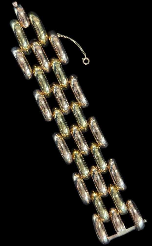 14k Gold Two Tone Bracelet: 14k Gold Two Tone Bracelet. Approx. 76.7 grams. Approx. 7 inches.