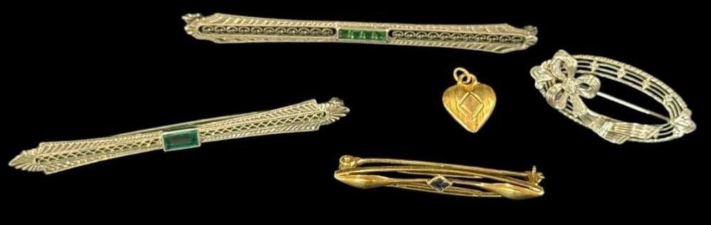 10k Gold pins etc.: 10k Gold pins etc. Approx. 10.5 grams.