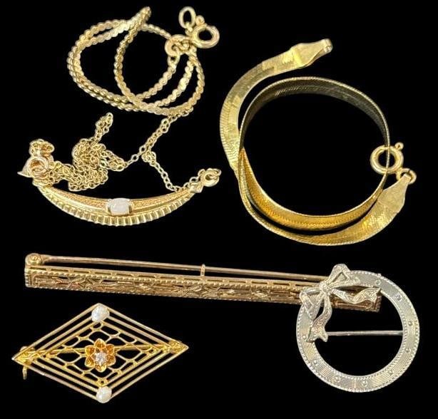 14k Gold pins, necklaces, etc.: 14k Gold pins, necklaces, etc. Approx. 12.4 grams.