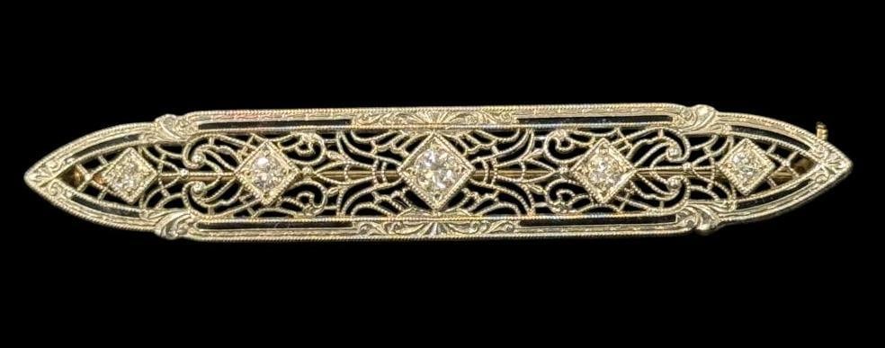 14k Gold Art Deco Bar Brooch: 14k Gold Art Deco Bar Brooch with Diamonds. Approx. 4.8 grams. Approx. 2.25 inches.