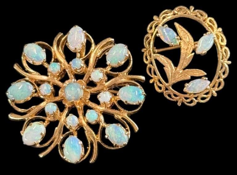2 14k Gold pins with Opals: 2 14k Gold pins with Opals. Approx. 14.4 grams.