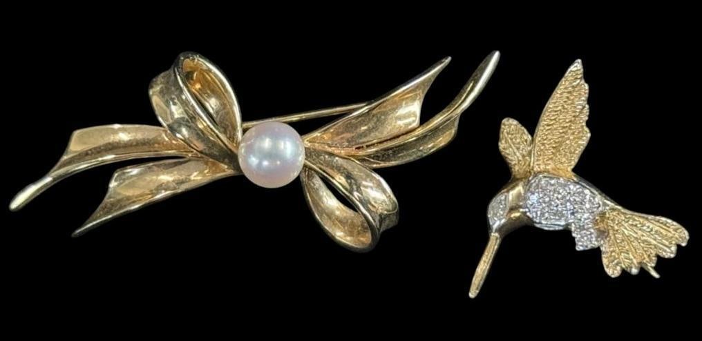 2 14k Gold Pins: 2 14k Gold Pins. Bow with pearl and Hummingbird. Approx. 8.3 grams.