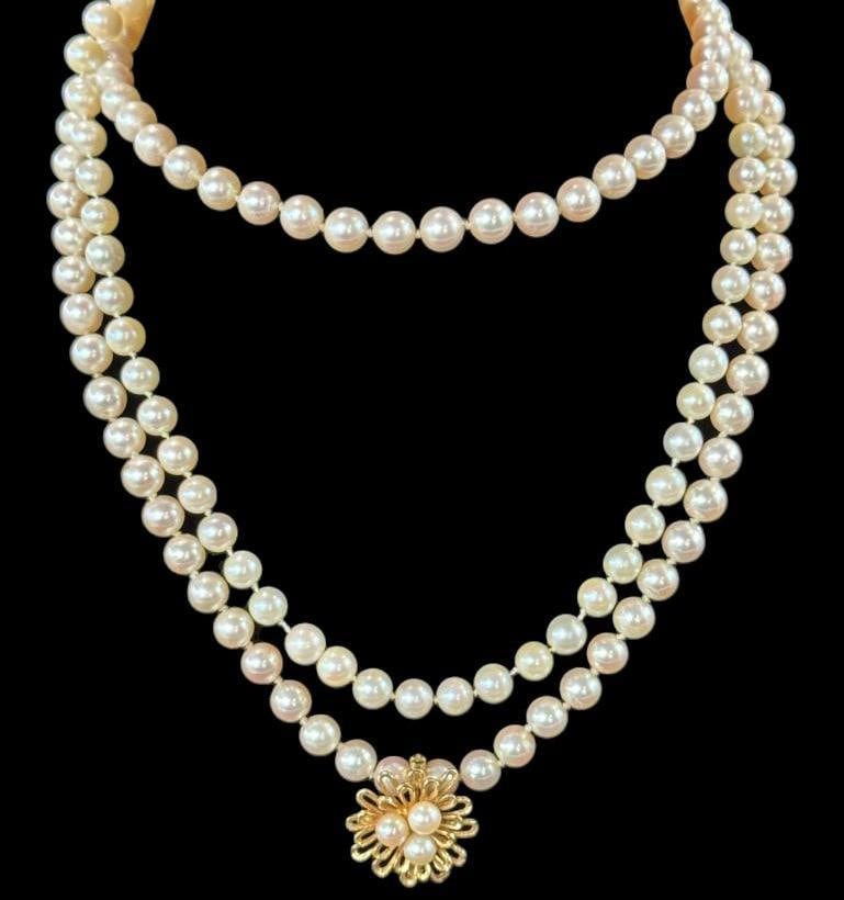 2 Pearl Necklaces: 2 Pearl Necklaces. One with 14k gold pin. One with 14k gold clasp.
