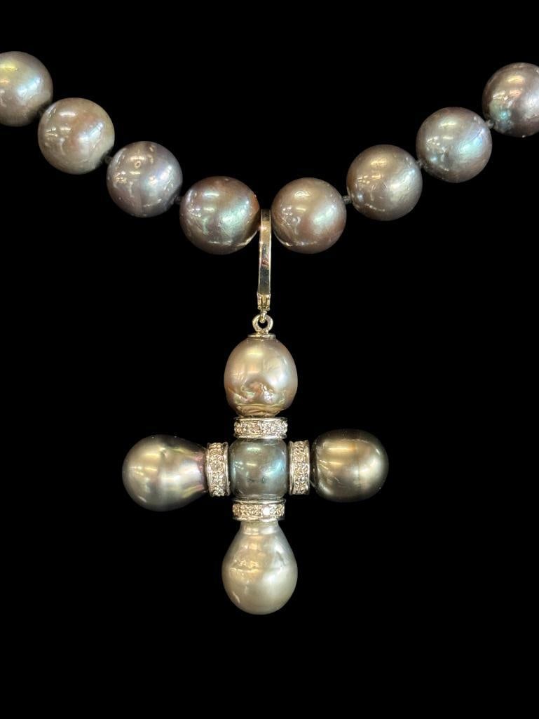 14k White Gold Cross Pearls and Diamonds: 14k White Gold Cross Pearls and Diamonds. Approx. 8.25 inches from clasp to pendant.