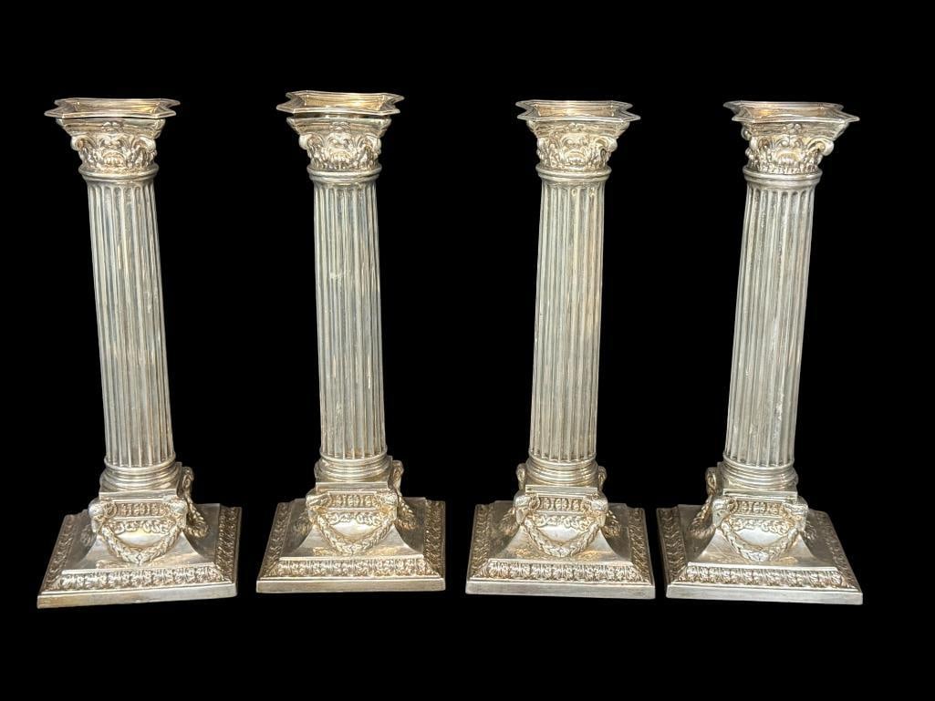 4 Sterling Silver Column Candlesticks: 4 Fabulous Sterling Silver Column Candlesticks. Pieces are hallmarked. Pieces are weighted. Approx. 9 x 3.5 x 3.5 inches.