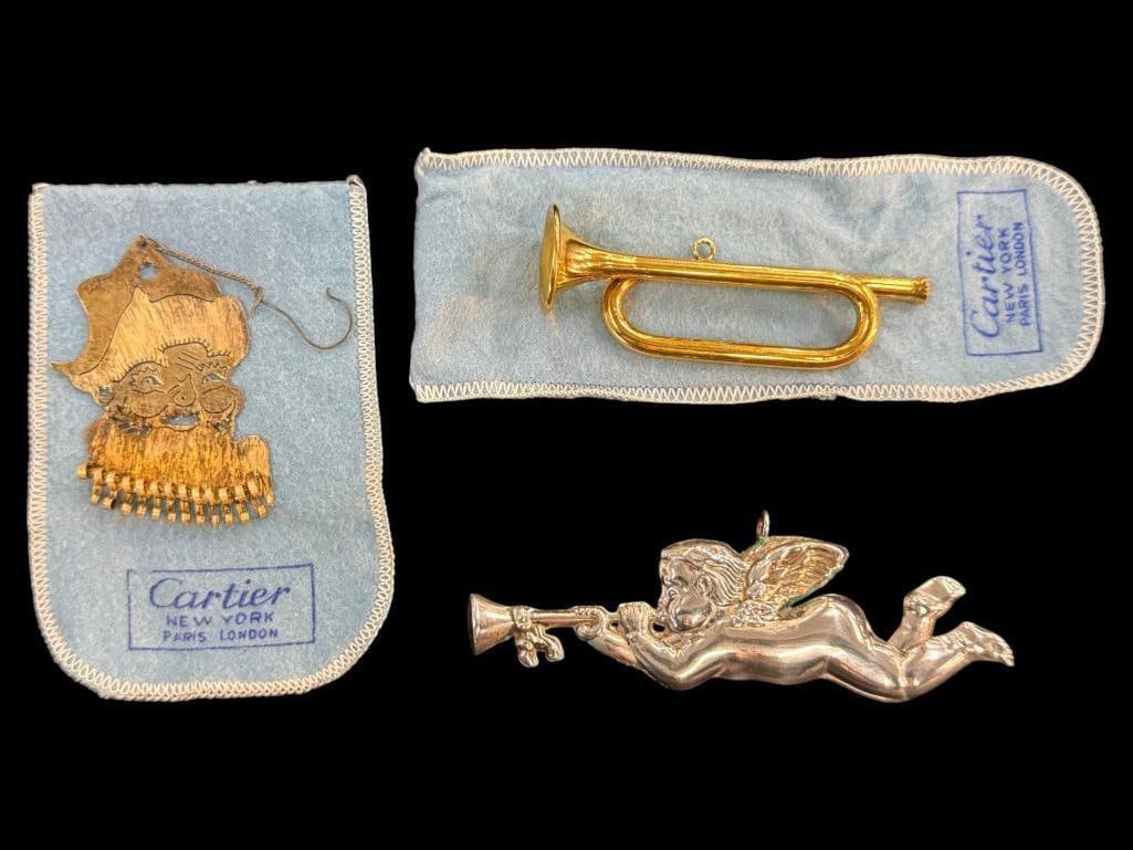 3 Sterling Silver Christmas Ornaments: 3 Sterling Silver Christmas Ornaments. Santa and Bugle are marked Cartier. Approx. 2.2 ozt.