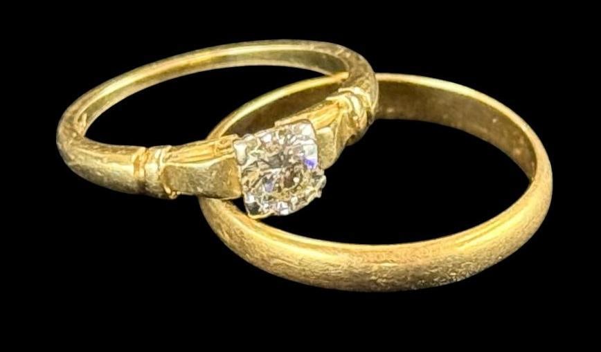 2 14k Gold Rings: 14k Gold ring with approx. 1/2 ct. diamond and 14k wedding band. Approx. 5.2 grams. Diamond ring Approx. size 7. Wedding band approx. size 9.
