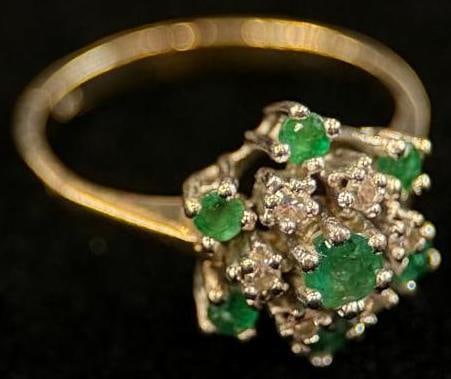 14k Gold ring with Diamonds: 14k Gold ring with Diamonds and Emerald colored stones. Approx. 2.8 grams. Approx. size 5.