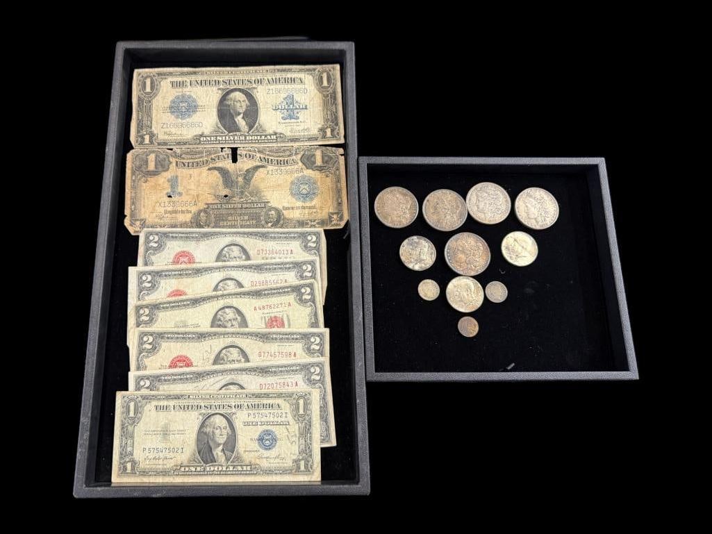 Morgan Silver Dollars, U.S. Currency etc.: 5 Morgan Silver Dollars, U.S. Currency including 1928 red seal $2 notes, Silver Certificates, 2 Kennedy silver halves and 2 barber dimes etc. Approx. 19 pieces.