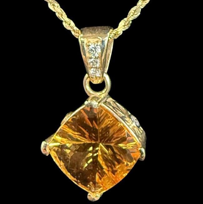 14k Gold Necklace with Citrine and Diamonds pendant: 14k Gold Necklace with Citrine and Diamonds pendant. Approx. 6.5 grams.