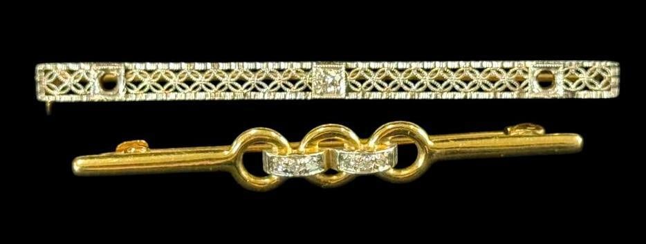 2 14k Gold Pins: 2 14k Gold Pins. Approx. 6 grams.