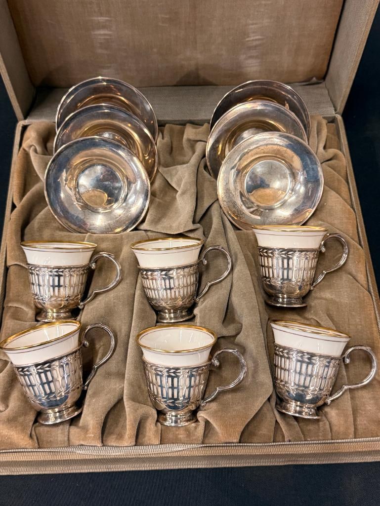 Sterling Silver 6 piece Demitasse Cups and Saucers: Sterling Silver 6 piece Demitasse Cups and Saucers with Lenox porcelain liners. Approx. 6.2 ozt. of sterling silver. Case approx. 11 x 11 x 4 inches.
