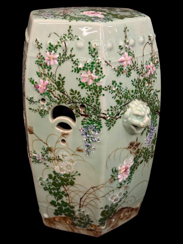 Japanese pottery stool: Japanese pottery stool with hand painted floral designs. Approx. 20 x 13 x 13 inches.