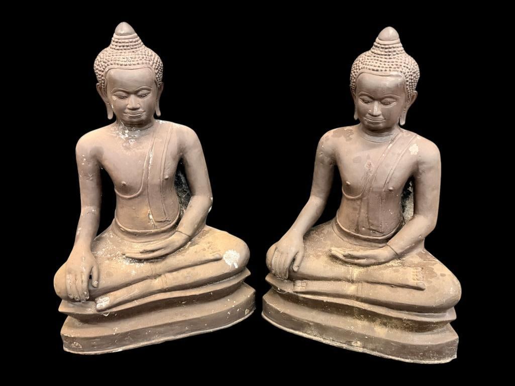Pair of Seated Buddha Statues: Pair of Seated Buddha Statues. Made of cast zinc and weighted. Approx. 19 x 12 x 8 inches.