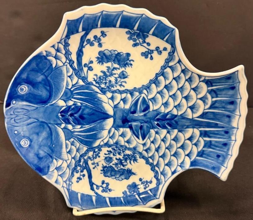 8 Japanese Blue White Porcelain Fish Plates: 8 Japanese Blue White Porcelain Fish Plates. Approx. 9 x 8 inches.
