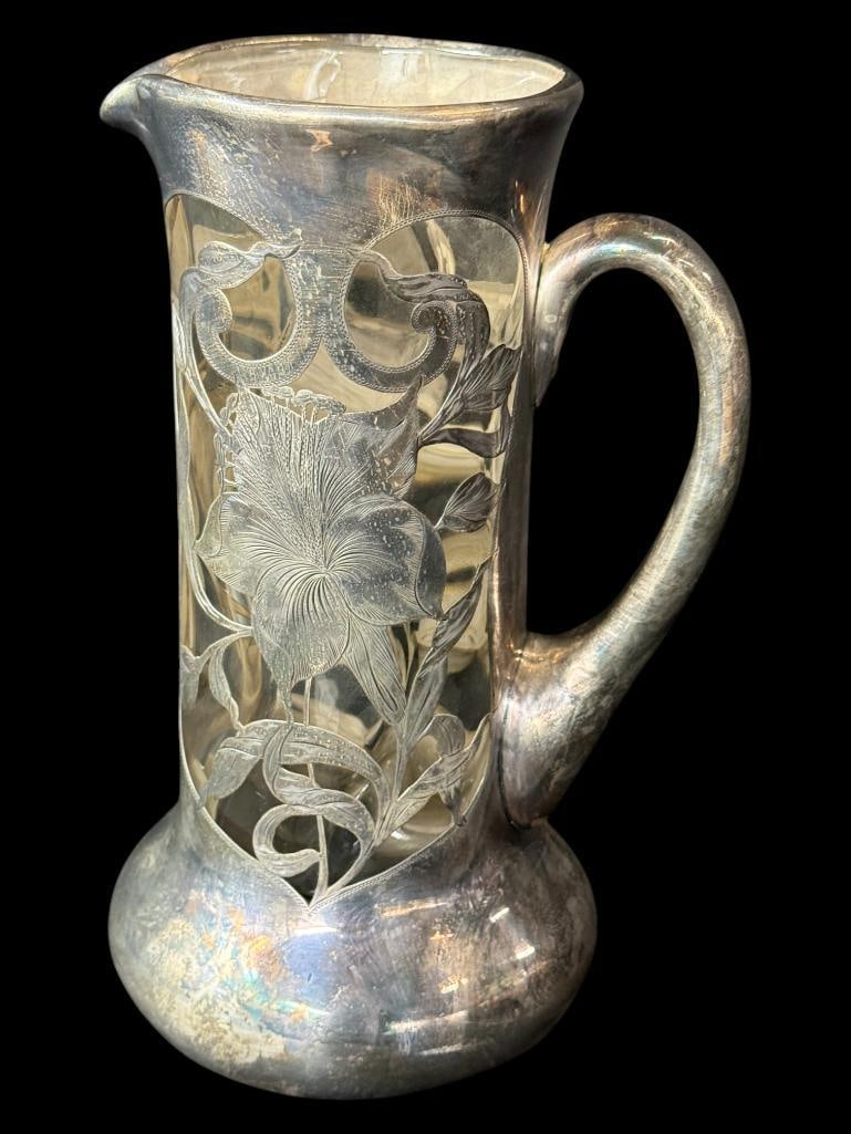 Art Nouveau Silver overlay Pitcher: Art Nouveau Silver overlay Pitcher. Approx. 10 inches tall.
