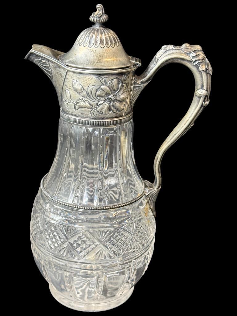 Gorham Sterling Silver Claret Jug: Victorian Cut Glass Claret Jug with Gorham hallmarked Sterling Silver Approx. 11 inches tall.