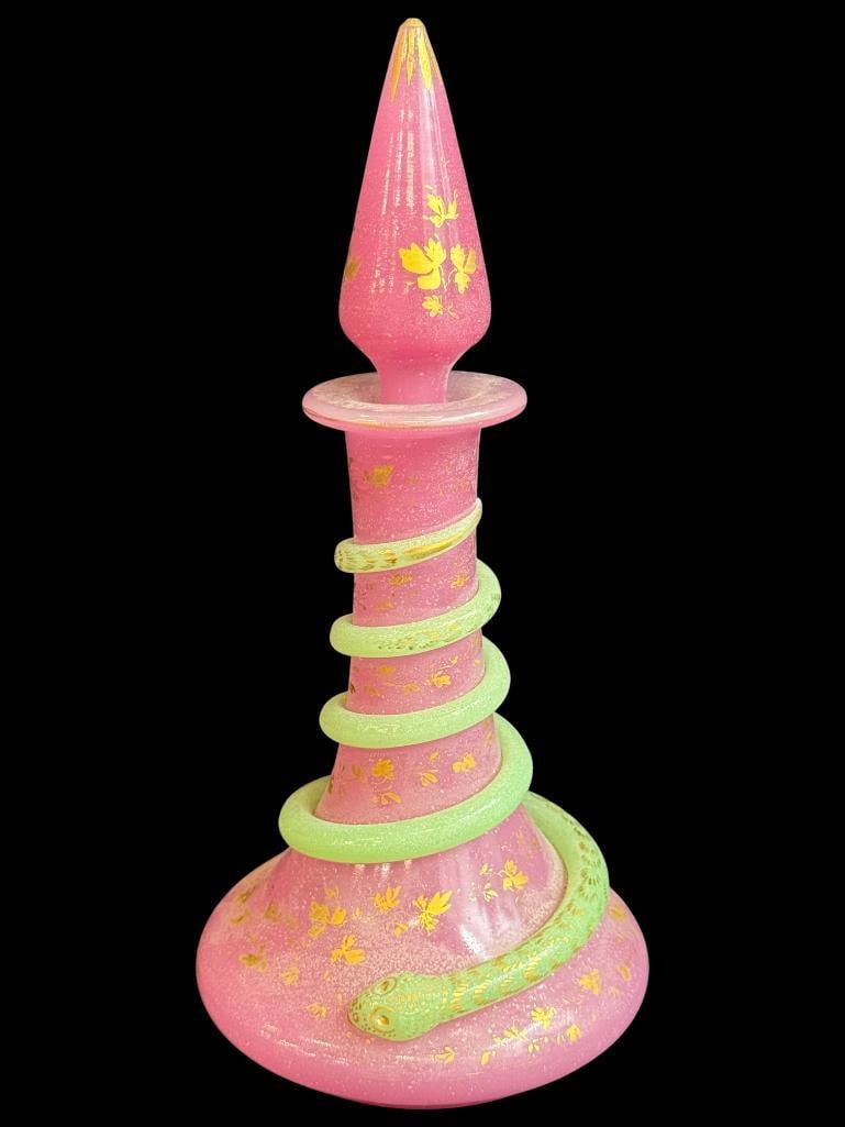 Victorian Pink Opaline decanter with Uranium glass snake: Victorian Pink Opaline decanter with Uranium glass snake. Approx. 10 inches tall.