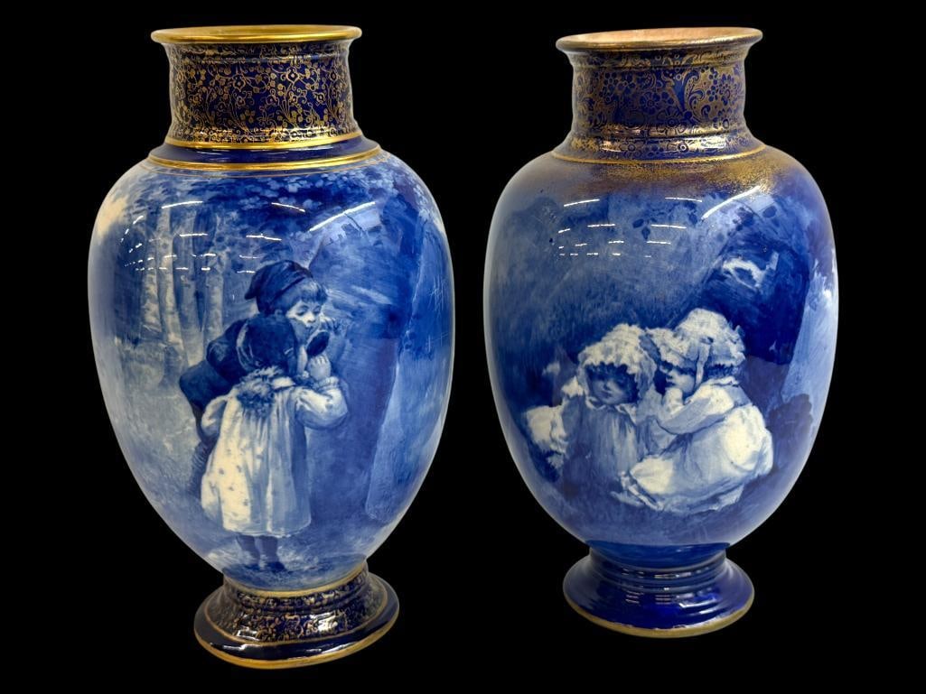 2 Royal Doulton Blue Children Vases: 2 Royal Doulton Blue Children Vases. Approx. 9.5 x 5 x 5 inches.