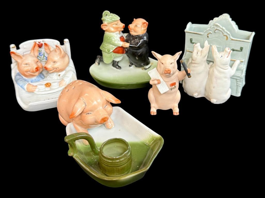 5 German Fairing Pig figurines: 5 German Fairing Pig figurines, including breakfast in bed, dancing, playing the piano and more.