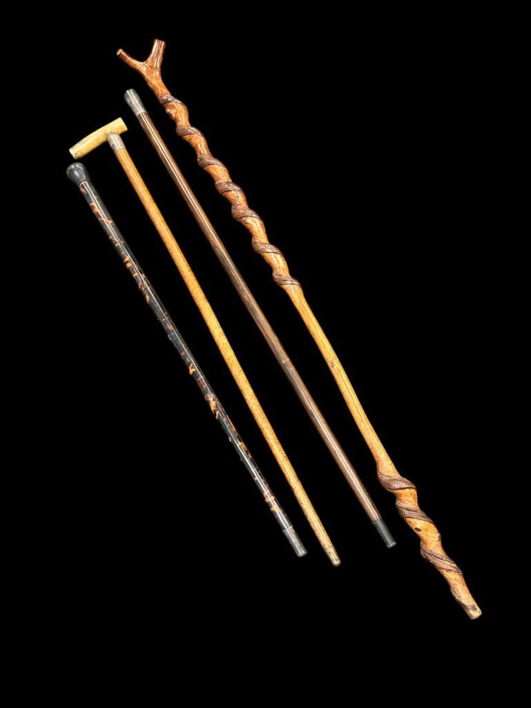 4 Antique Canes: 4 Antique Canes. Some with Sterling Silver, Burl and Bone handle. Tallest Approx. 42 inches.