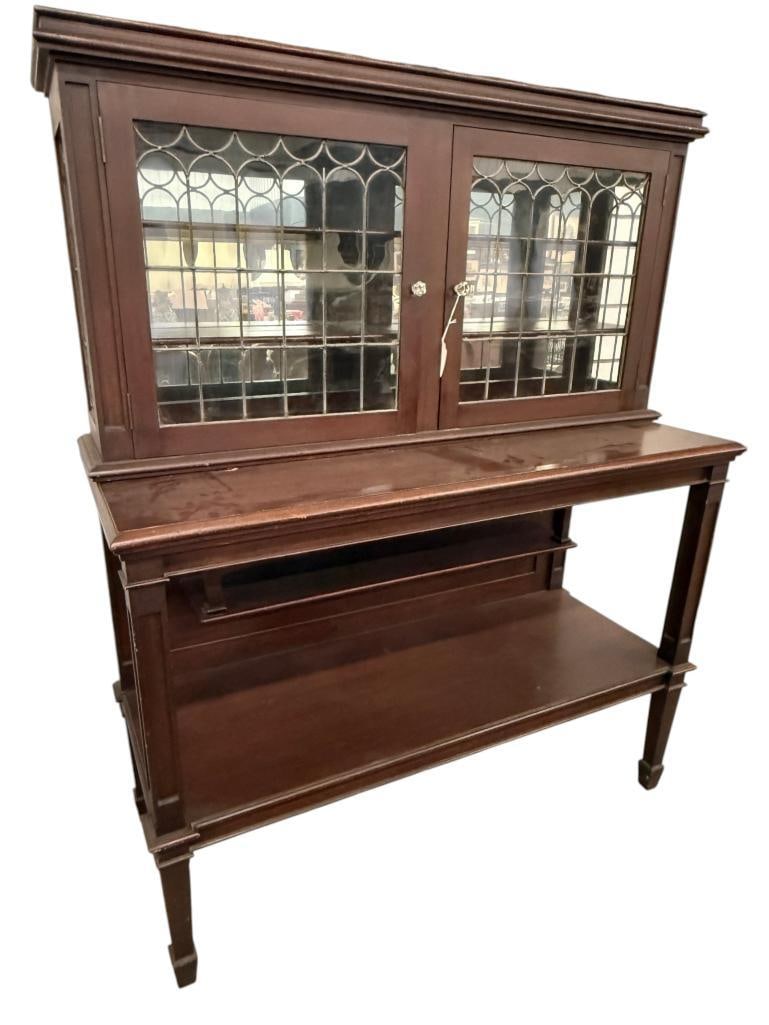 Charles Rohlfs Mahogany Sideboard: Charles Rohlfs Mahogany Sideboard with leaded glass windows. Approx. 62 x 50 x 20 inches.