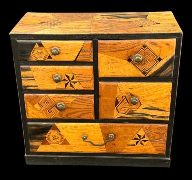 Japanese Parquetry Table Cabinet: Japanese Parquetry Table Cabinet. Wonderful geometric inlays. Possibly Meiji period (1862-1912). Approx. 12 x 12 x 5.5 inches.