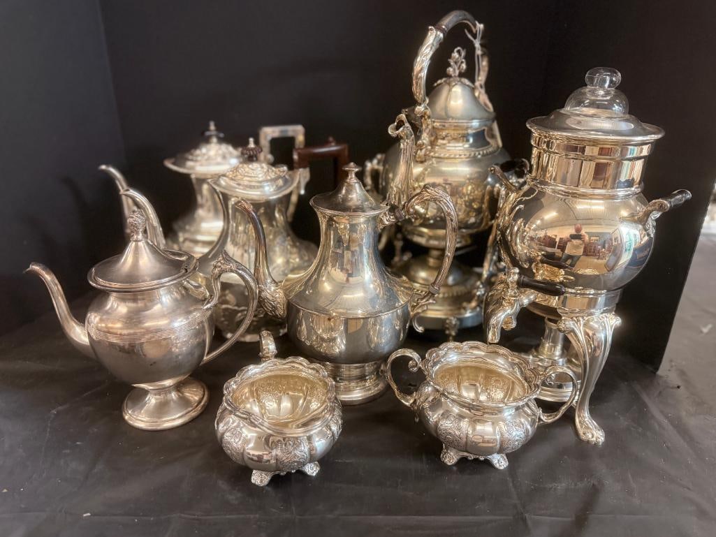 Fancy silver plate tea pots and more: Fancy silver plate tea pots and more. 8 pieces. Largest approx. 16 x 8 x 8 inches.