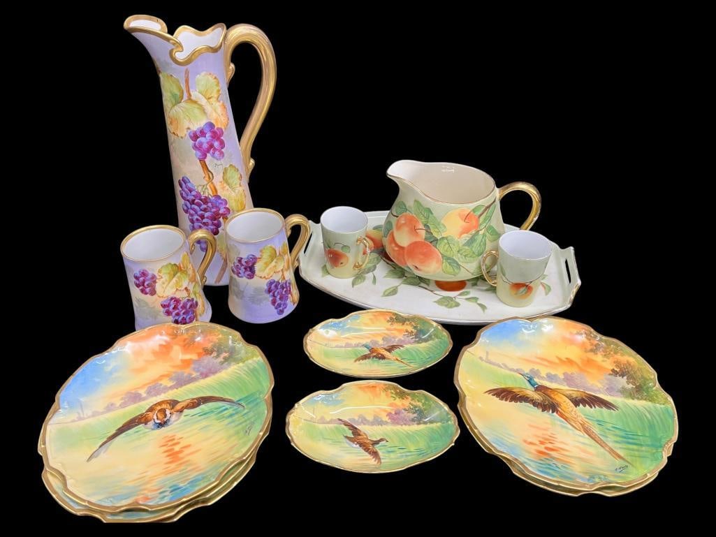 Limoge painted plates, pitchers and more: Limoge painted plates, pitchers and more. Tallest approx. 15 x 8 x 6 inches.