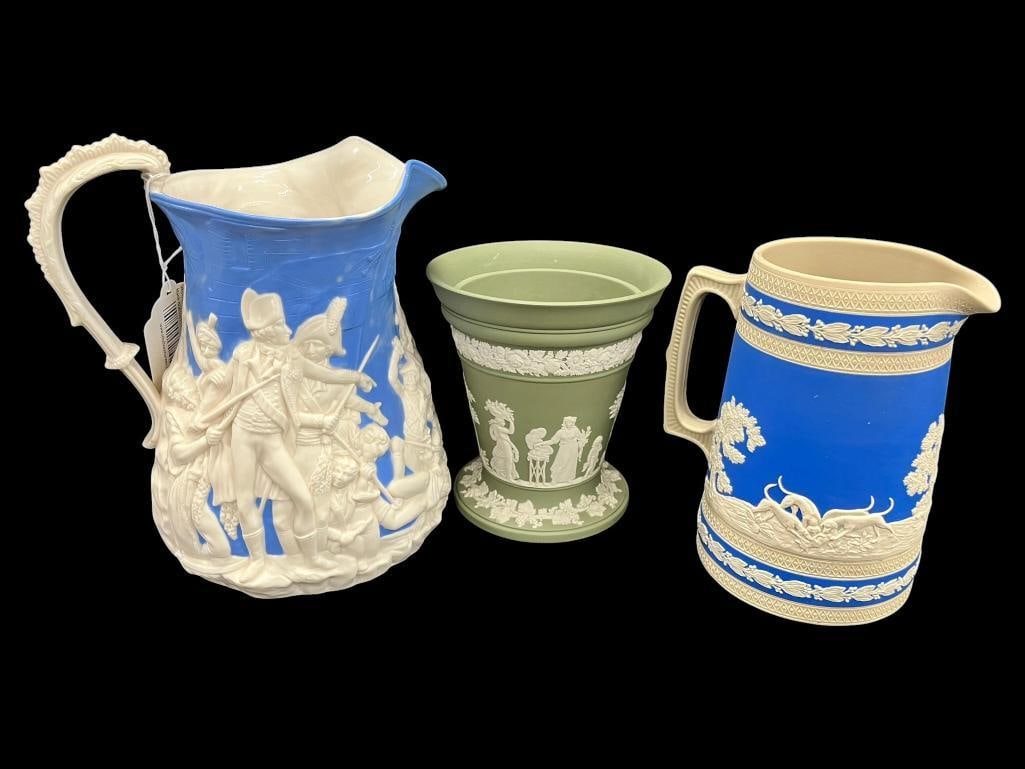 Wedgwood Jasperware vase and more: Wedgwood Jasperware vase, Copeland pitcher and Alcock Napoleon Battle Scene glazed bisque relief pitcher. 3 pieces. Alcock approx. 10 x 9 x 8 inches.
