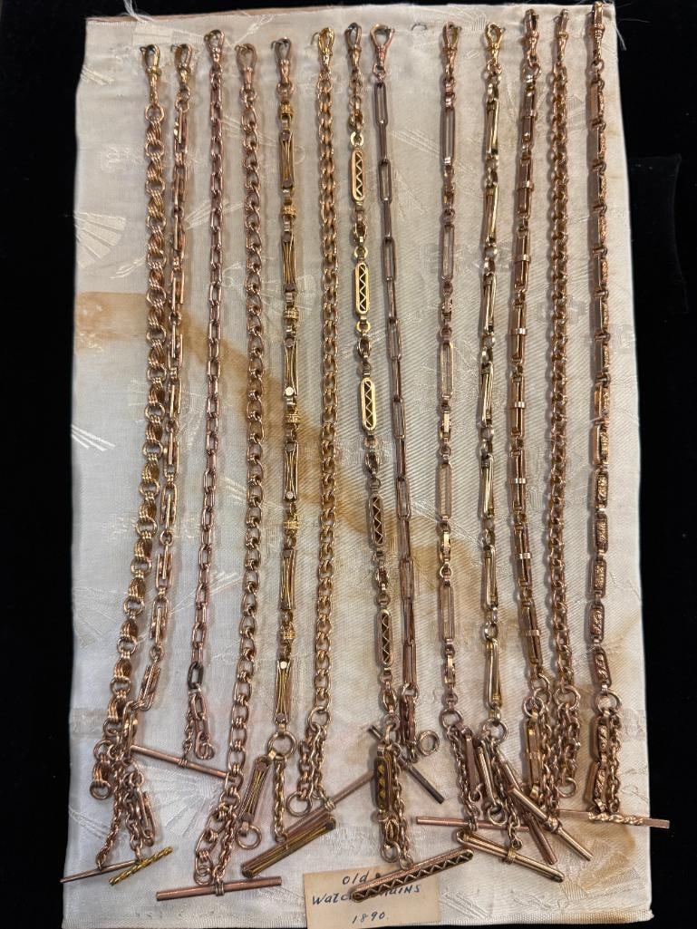 13 Gold Filled Watch Chains: 13 Gold Filled Watch Chains. Salesman Sample / New Old Stock. c. 1890. Chains range in size from 11.5 to 12.5 inches.
