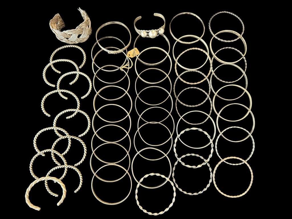 Sterling Silver Bracelets and Cuffs: Sterling Silver Bracelets and Cuffs. Approx. 15.5 ozt. Approx. 45 pieces.