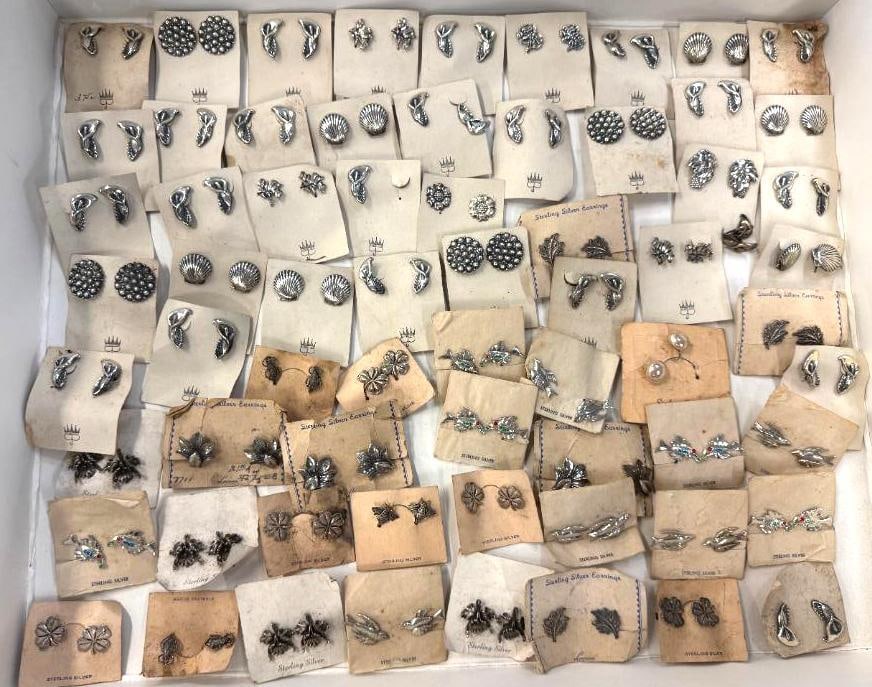 New Old Stock Sterling Silver Earrings: New Old Stock Sterling Silver Earrings on paper cards. Approx. 15.85 ozt with cards. Featuring flower, bird, shell designs and more.