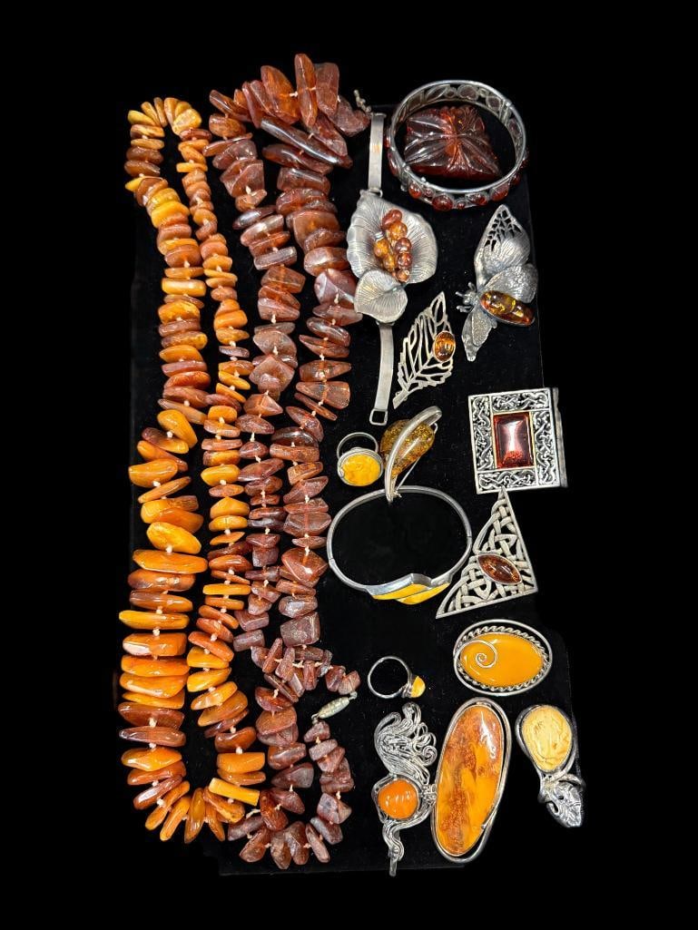 Amber Necklaces, Pins and more: Costume jewelry, Amber Necklaces, Pins, Bracelets and Rings. Some pieces sterling silver. Approx. 17 pieces.