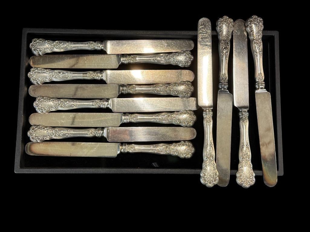 12 Sterling Silver handle knives: 12 Sterling Silver Buttercup pattern handle knives. Approx. 6 ozt. Knives are counted as 1/2 ozt each.