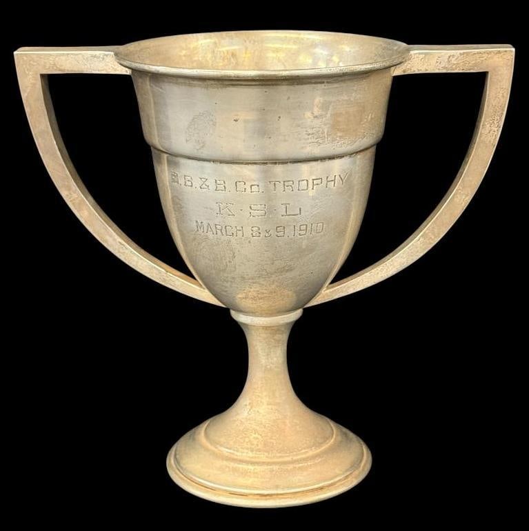 Sterling Silver Trophy: Sterling Silver Trophy. Approx. 13.7 ozt. Reads - B.B. & B. Co. Trophy, K.S.L, March 8&9 1910. Approx. 8 x 8.73 x 5 inches.